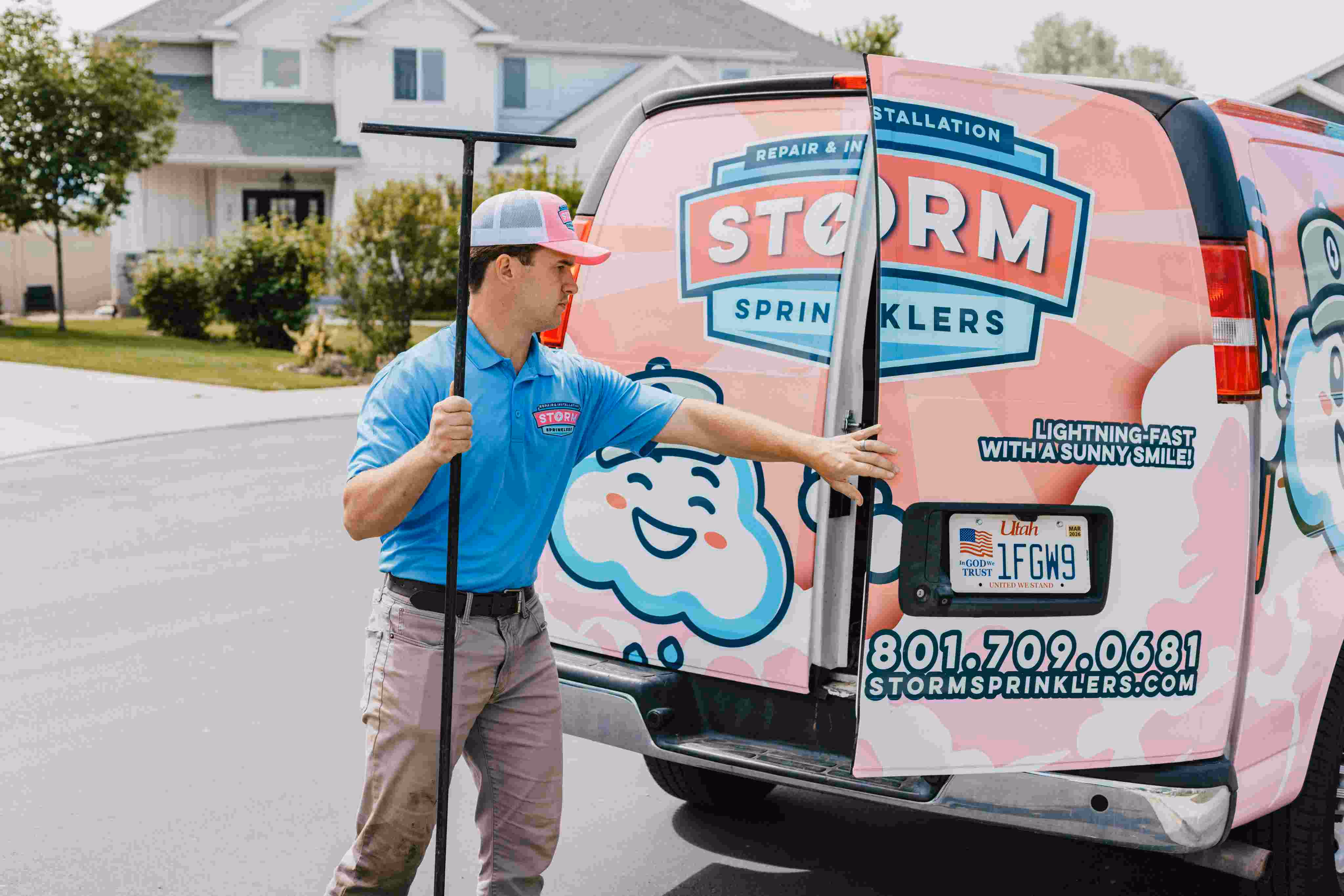 Storm Sprinklers technician with stop-and-waste key for Utah sprinkler valve repair