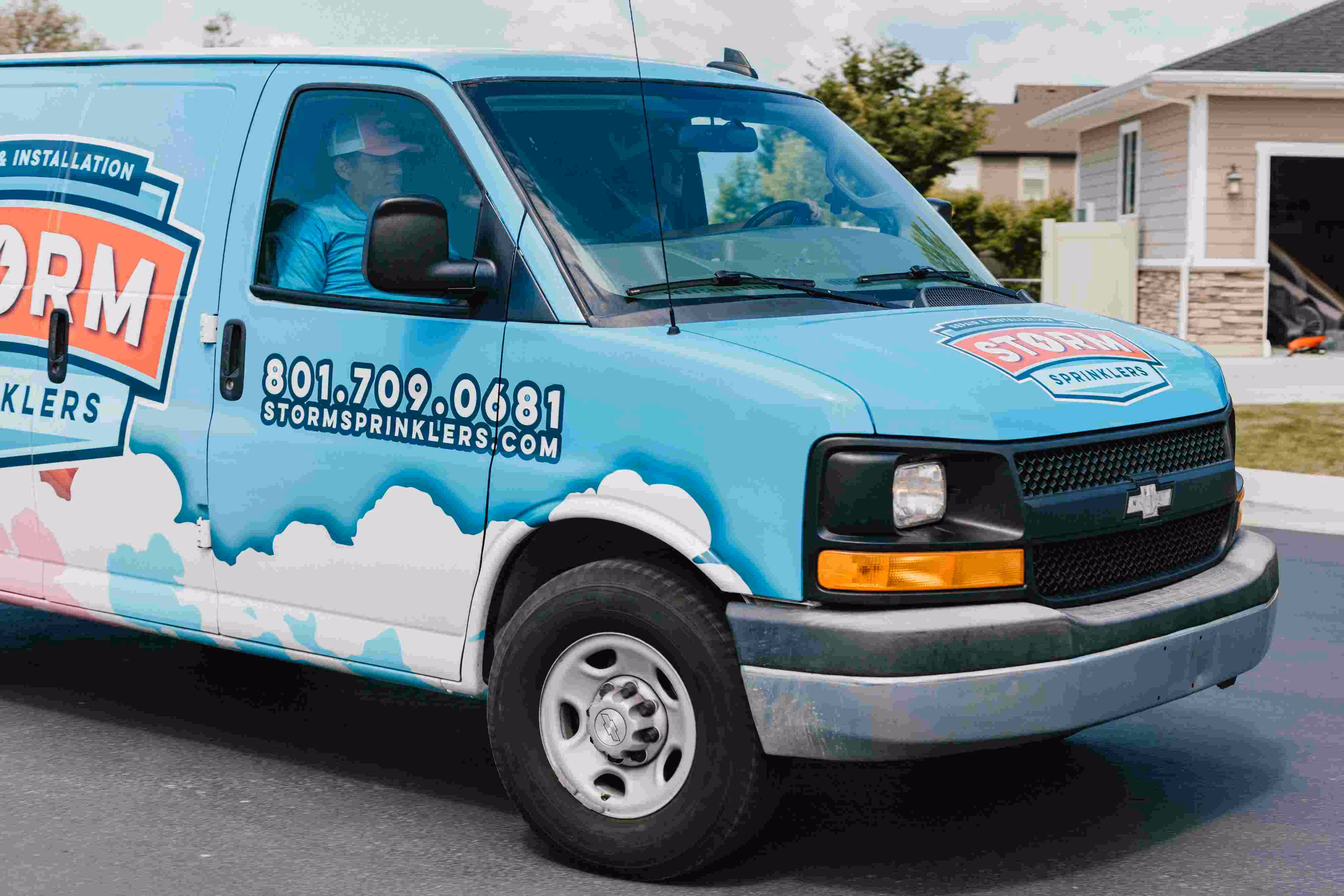 Storm Sprinklers installation crew and service van