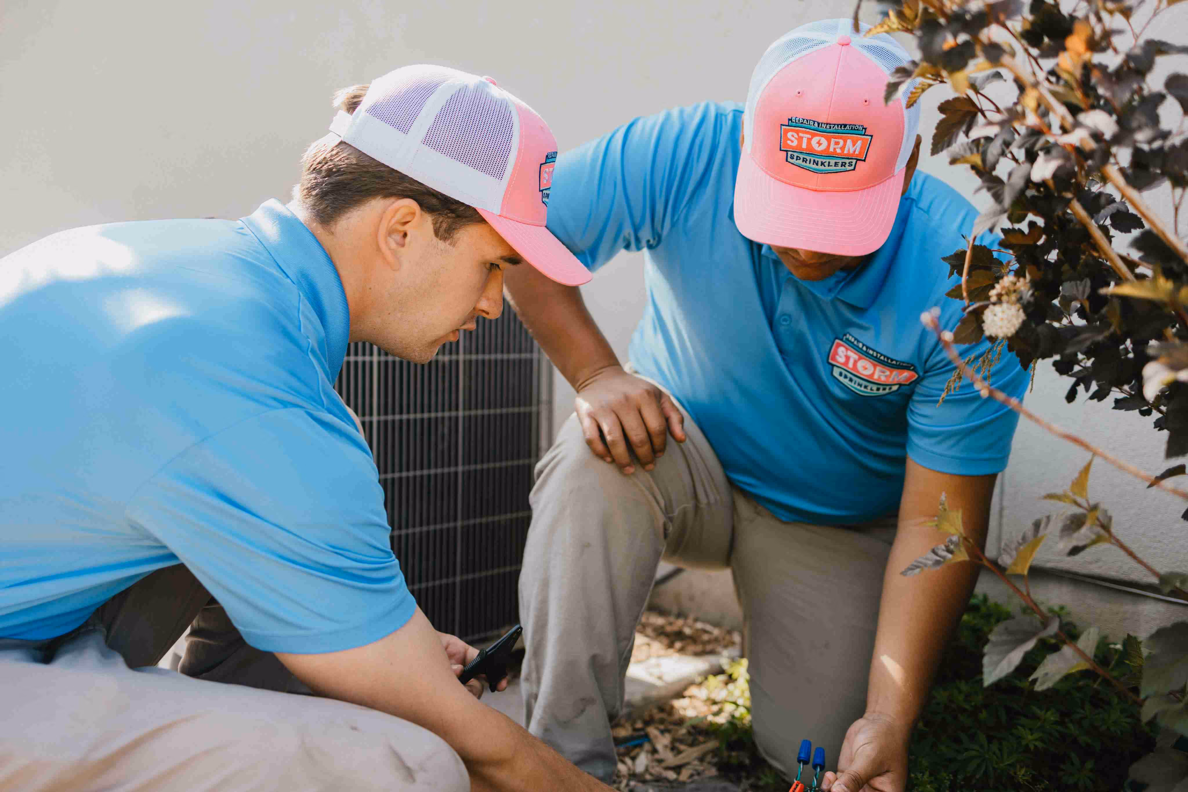 Irrigation install crew member installing a residential sprinkler system in Utah