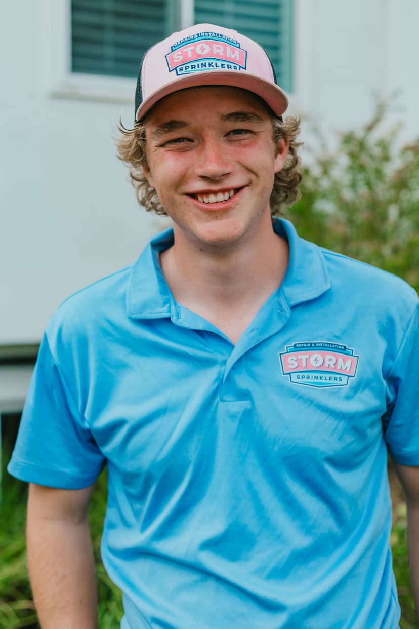 Storm Sprinklers technician performing summer tune-up